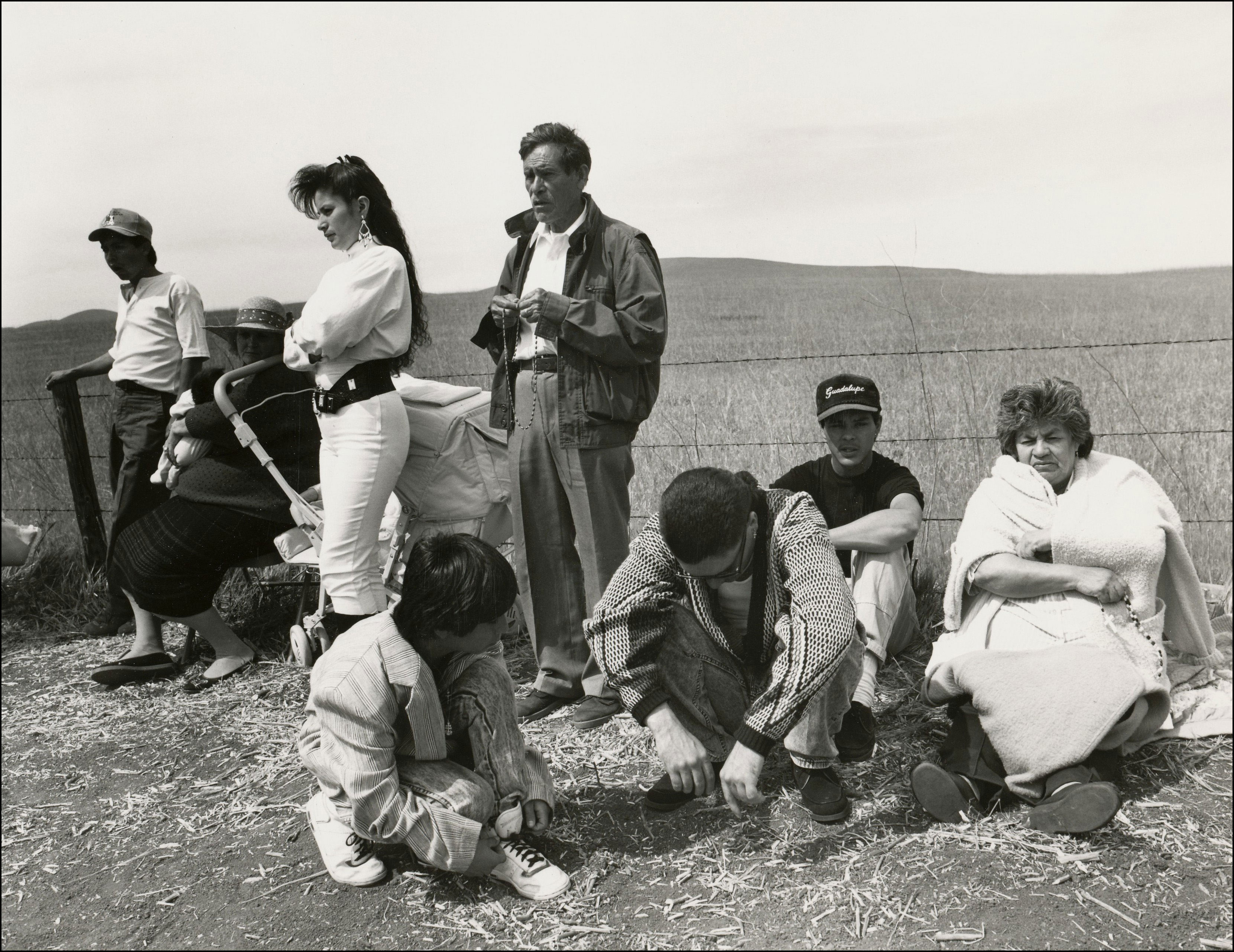 Group of people waiting for Mary on Easter Sunday along the side of the Highway
