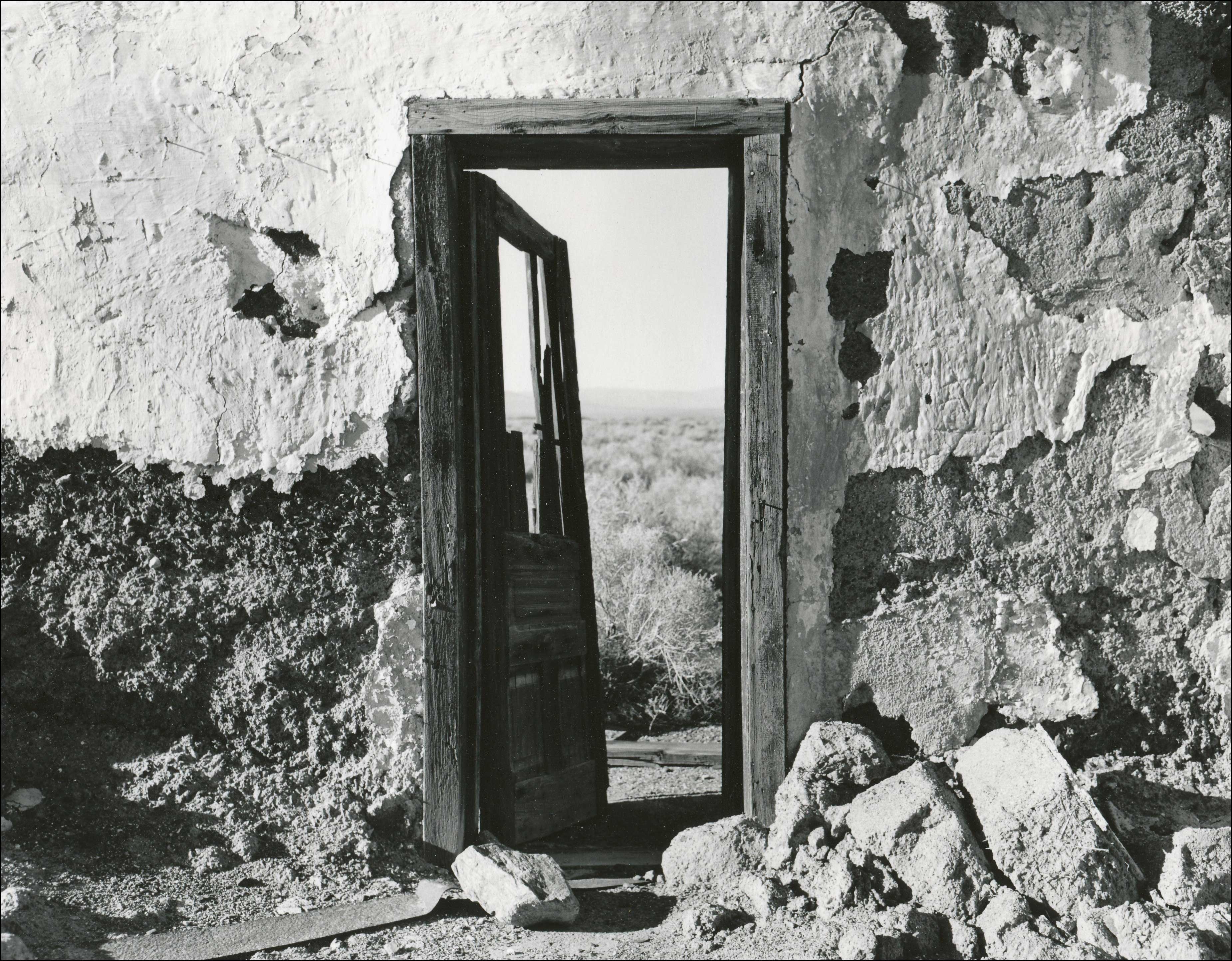 open door with wood frame still set in very old building